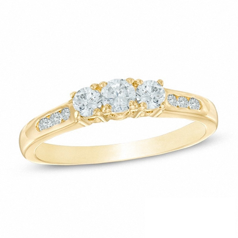Main Image 1 of Previously Owned - 1/2 CT. T.W. Diamond Past Present Future® Ring in 14K Gold