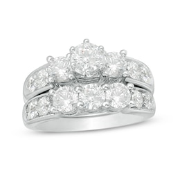Previously Owned - 3 CT. T.W. Diamond Past Present Future® Bridal Set in 14K White Gold