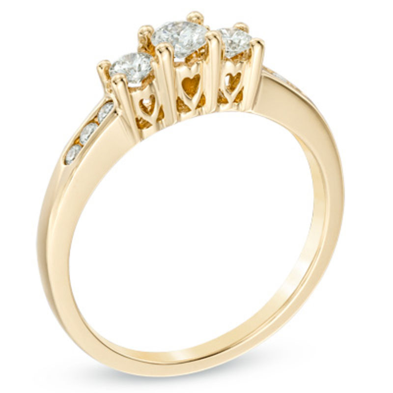 Previously Owned - 1/2 CT. T.W. Diamond Past Present Future® Engagement Ring in 14K Gold