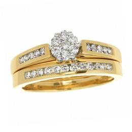 Previously Owned - 1 CT. T.W. Diamond Flower Bridal Set in 10K Gold