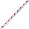 Thumbnail Image 0 of Previously Owned - Lab-Created Ruby and White Sapphire Vintage-Style Tennis Bracelet in Sterling Silver - 7.25"