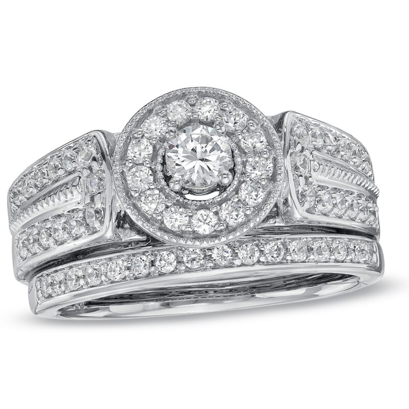 Main Image 1 of Previously Owned - 3/4 CT. T.W. Diamond Frame Bridal Set in 10K White Gold