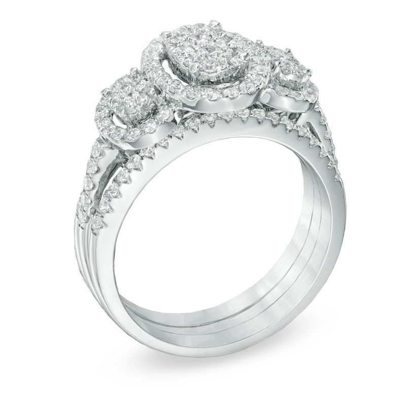 Main Image 2 of Previously Owned - 1 CT. T.W. Diamond Oval Frame Three Stone Cluster Three Piece Bridal Set in 10K White Gold