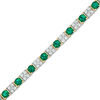 Thumbnail Image 0 of Previously Owned - Baguette Lab-Created Emerald and White Sapphire Bracelet in Sterling Silver with 14K Gold Plate - 7.25"