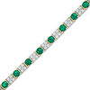 Thumbnail Image 1 of Previously Owned - Baguette Lab-Created Emerald and White Sapphire Bracelet in Sterling Silver with 14K Gold Plate - 7.25"