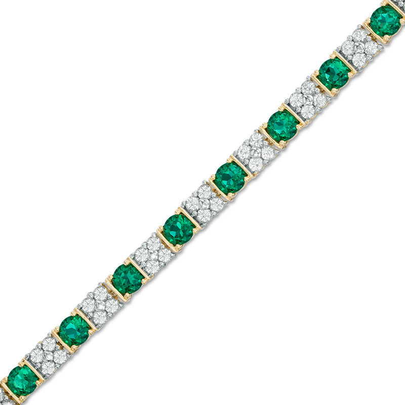 Previously Owned - Baguette Lab-Created Emerald and White Sapphire Bracelet in Sterling Silver with 14K Gold Plate - 7.25"