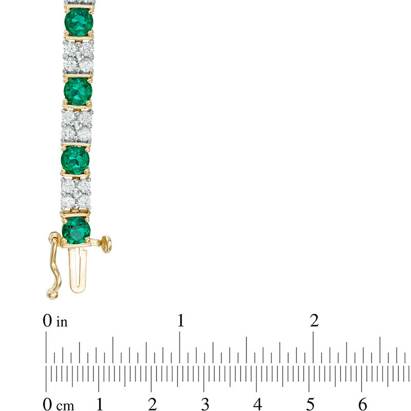 Previously Owned - Baguette Lab-Created Emerald and White Sapphire Bracelet in Sterling Silver with 14K Gold Plate - 7.25"