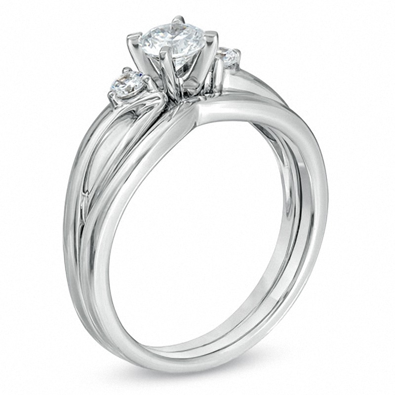 Main Image 2 of Previously Owned - 1/2 CT. T.W. Diamond Three Stone Split Shank Bridal Set in 14K White Gold (I/SI2)