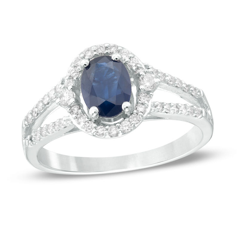 Previously Owned - Oval Blue Sapphire and 1/3 CT. T.W. Diamond Frame Ring in 10K White Gold