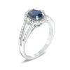 Thumbnail Image 1 of Previously Owned - Oval Blue Sapphire and 1/3 CT. T.W. Diamond Frame Ring in 10K White Gold