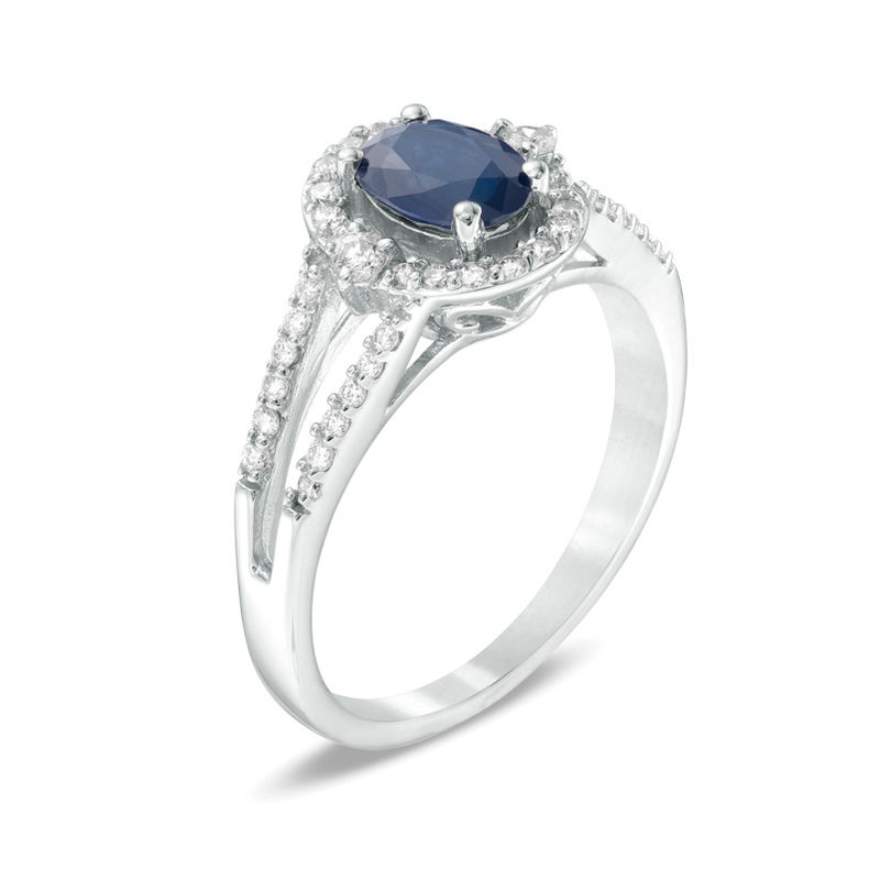 Previously Owned - Oval Blue Sapphire and 1/3 CT. T.W. Diamond Frame Ring in 10K White Gold