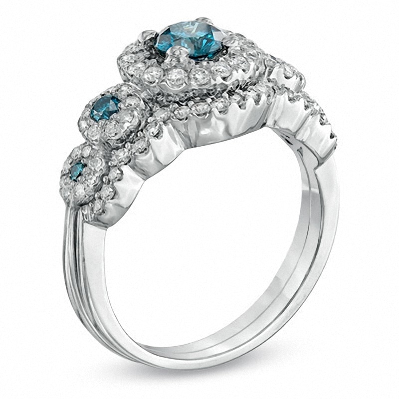 Previously Owned - 1-1/8 CT. T.W. Enhanced Blue and White Diamond Five Stone Frame Bridal Set in 14K White Gold