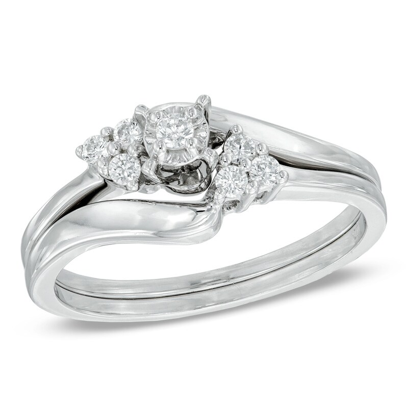 Main Image 1 of Previously Owned - 1/6 CT. T.W. Diamond Three Stone Slant Bridal Set in 10K White Gold