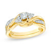 Thumbnail Image 1 of Previously Owned - 1/3 CT. T.W. Diamond Twist Shank Bridal Set in 10K Gold