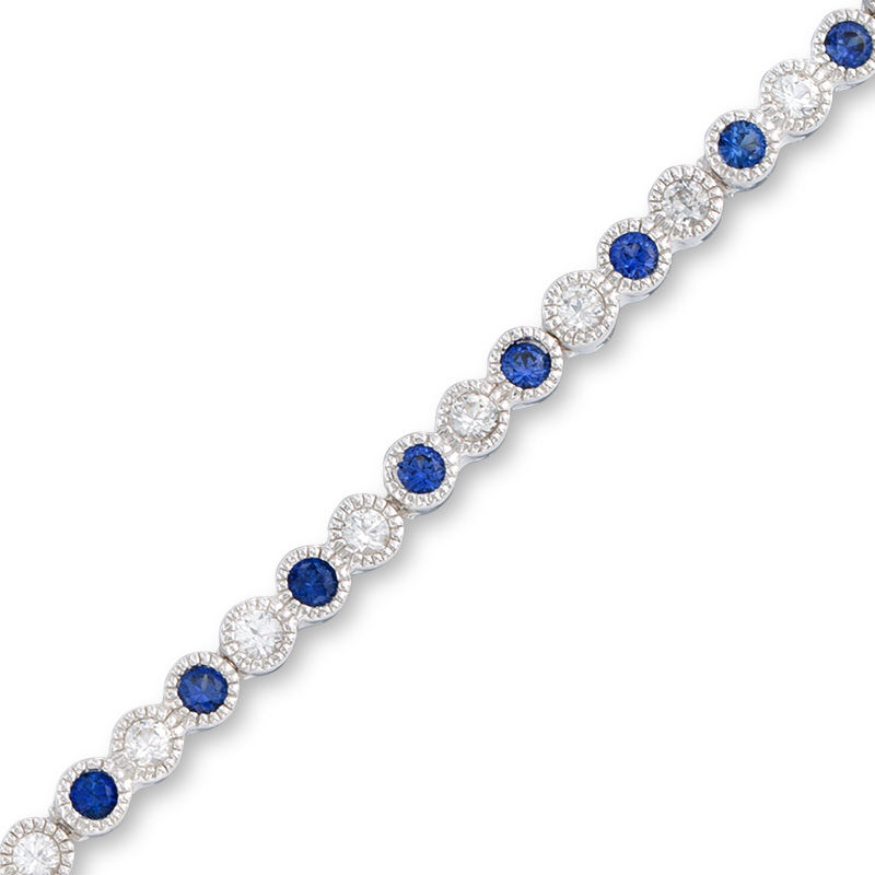 Main Image 1 of Previously Owned - Lab-Created Blue and White Sapphire Vintage-Style Tennis Bracelet in Sterling Silver - 7.25"