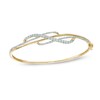 Thumbnail Image 1 of Previously Owned - 1 CT. T.W. Diamond Crossover Bangle in 10K Gold