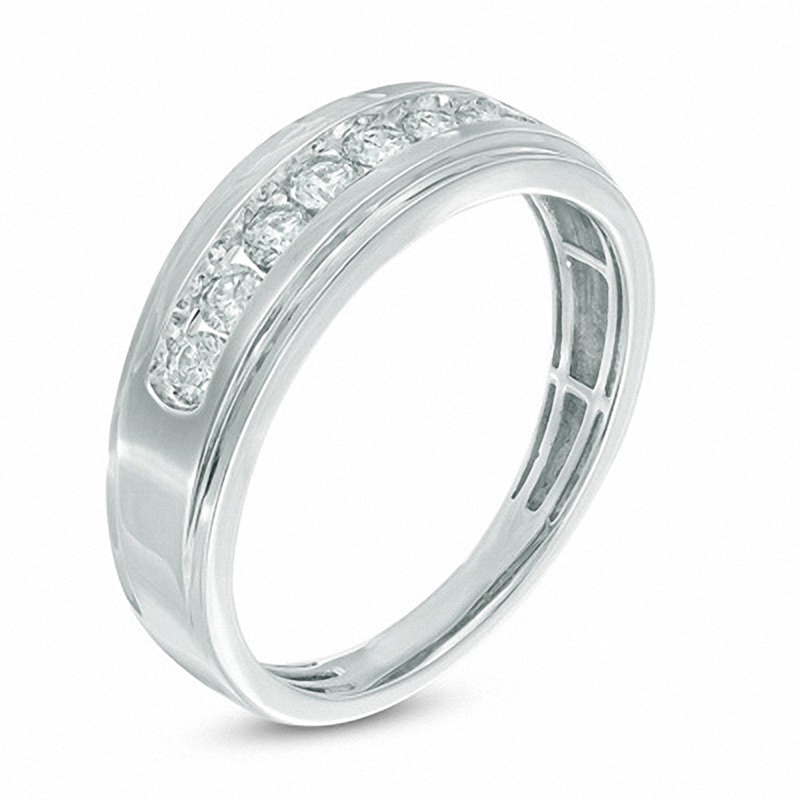 Previously Owned - Men's 1/3 CT. T.W. Diamond Seven Stone Step Edge Anniversary Band in 10K White Gold