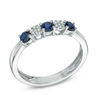 Thumbnail Image 1 of Previously Owned - Blue Sapphire and 1/20 CT. T.W. Diamond Three Stone Band in 10K White Gold
