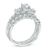 Previously Owned - 1-1/4 CT. T.W. Diamond Three Stone Bridal Set in 14K White Gold (I/I1)