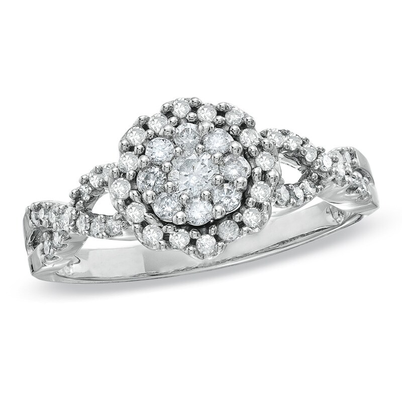 Previously Owned - 1/2 CT. T.W. Diamond Flower Twist Shank Ring in 10K White Gold