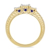 Previously Owned - 1/2 CT. T.W. Enhanced Blue and White Quad Princess-Cut Diamond Three Stone Ring in 10K Gold
