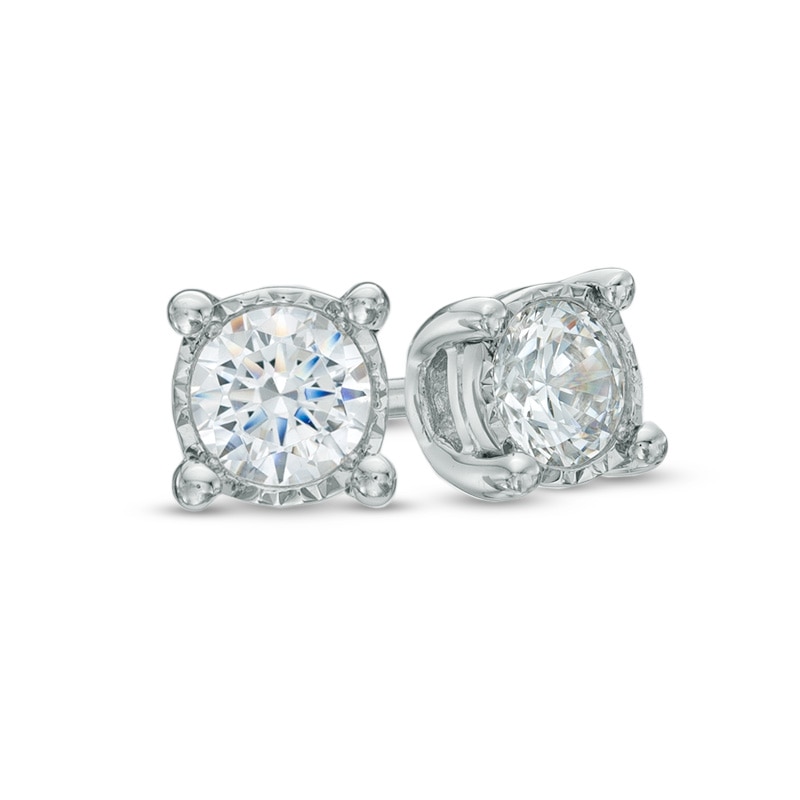 Previously Owned - 1/10 CT. T.W. Diamond Solitaire Stud Earrings in Sterling Silver