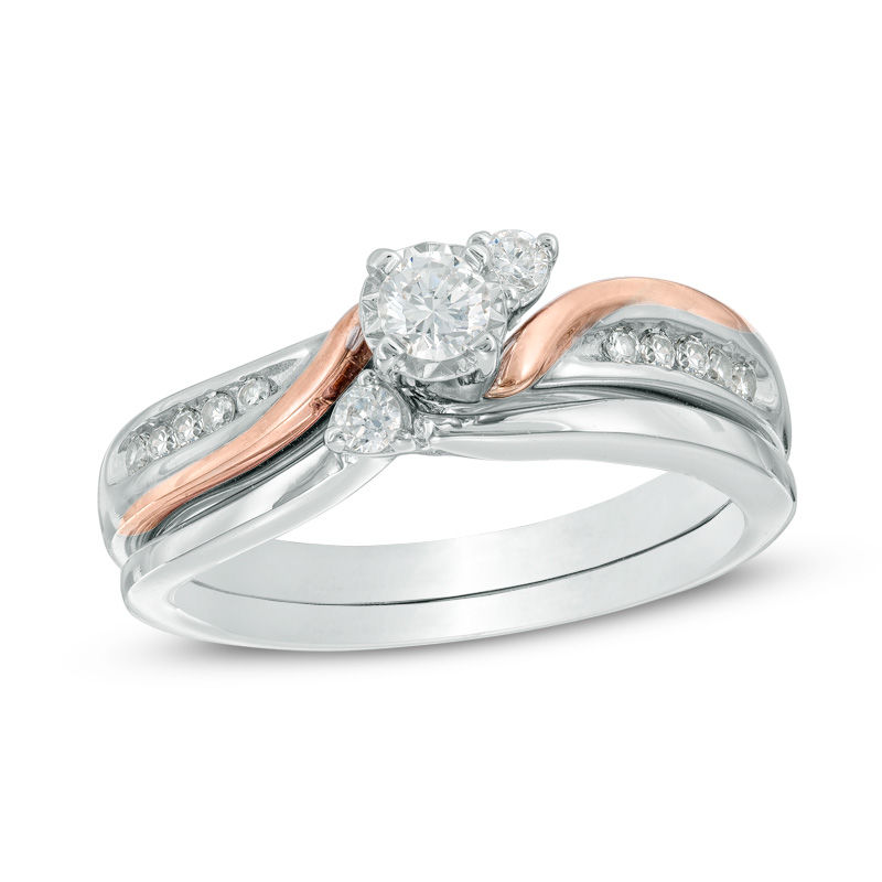 Main Image 1 of Previously Owned - 1/3 CT. T.W. Diamond Three Stone Slant Bridal Set in 10K Two-Tone Gold