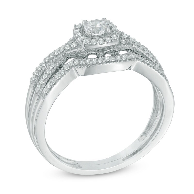 Main Image 2 of Previously Owned - 1/3 CT. T.W. Diamond Cushion Frame Twisted Shank Bridal Set in 10K White Gold