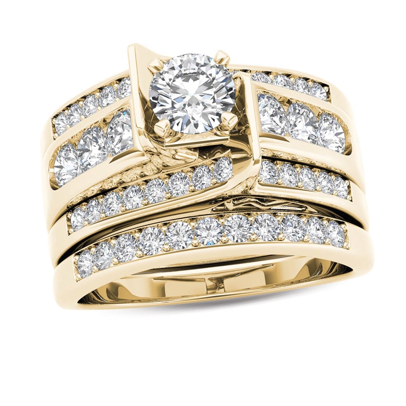 Previously Owned - 1-1/4  CT. T.W. Diamond Multi-Row Bridal Set in 14K Gold