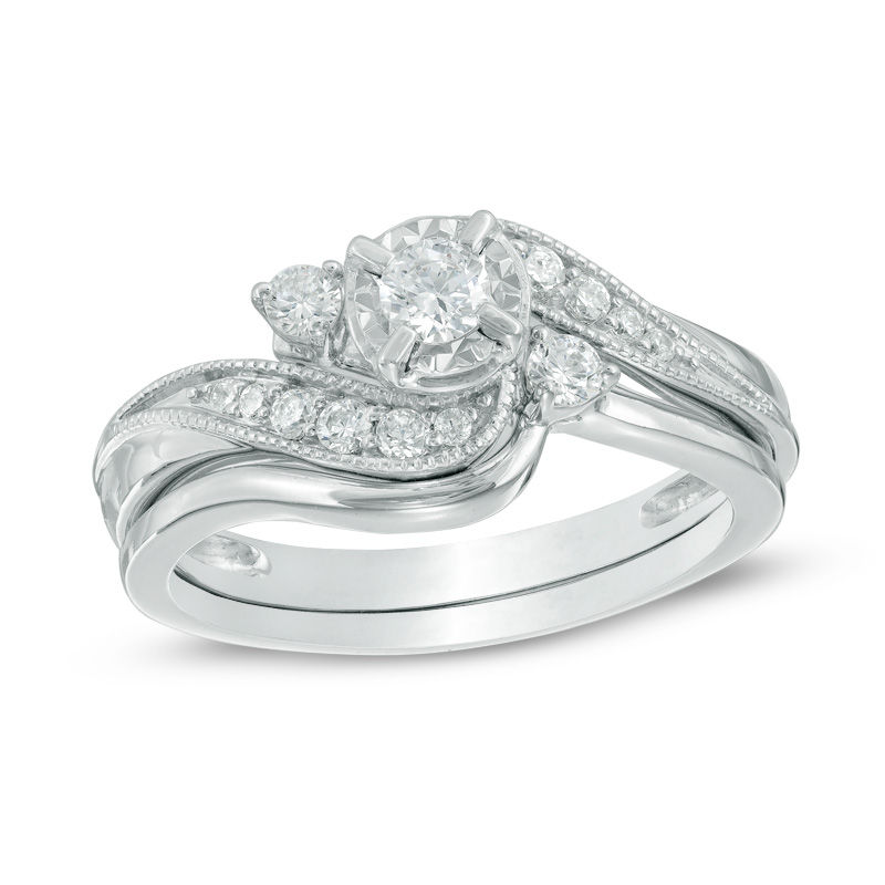 Main Image 1 of Previously Owned - 3/8 CT. T.W. Slant Three Stone Bridal Set in 10K White Gold