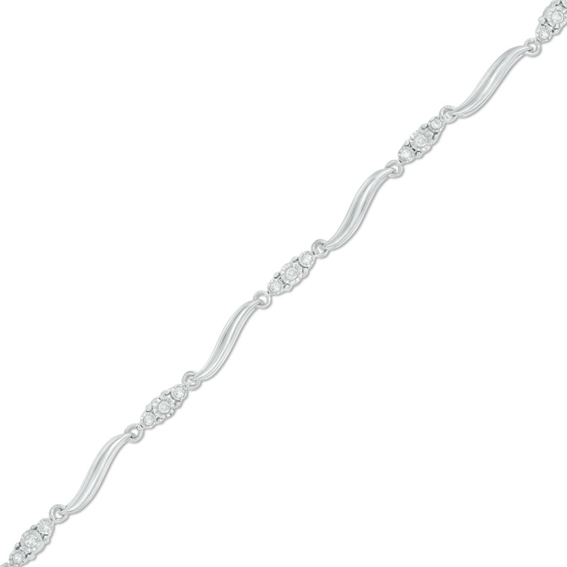 Previously Owned - 1/8 CT. T.W. Diamond Three Stone Curved Station Bracelet in 10K White Gold