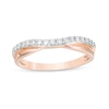 Thumbnail Image 0 of Previously Owned - 1/5 CT. T.W. Diamond Two Row Twist Contour Wedding Band in 14K Rose Gold