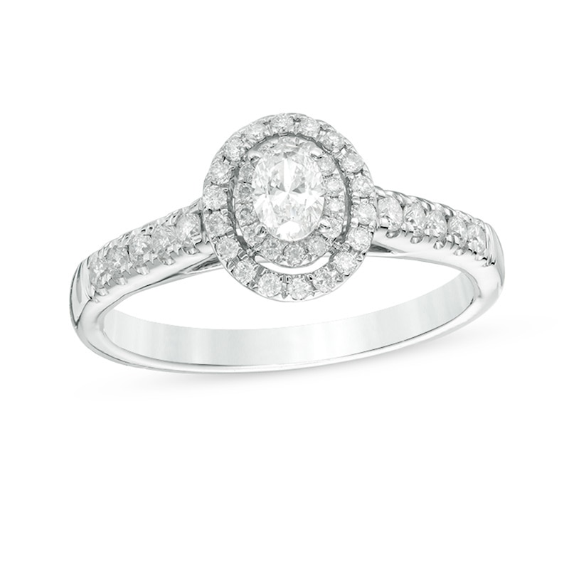 Main Image 1 of Previously Owned - 1/2 CT. T.W. Oval Diamond Double Frame Engagement Ring in 14K White Gold