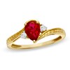 Thumbnail Image 1 of Previously Owned - Pear-Shaped Lab-Created Ruby and Diamond Accent Bypass Ring in 10K Gold