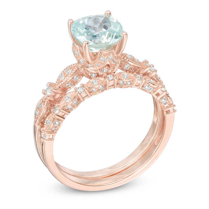 Previously Owned - 7.0mm Cushion-Cut Aquamarine and 1/3 CT. T.W. Diamond Bridal Set in 14K Rose Gold