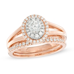 Previously Owned - 3/4 CT. T.W. Diamond Double Oval Frame Split Shank Bridal Set in 10K Rose Gold