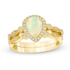 Previously Owned - Pear-Shaped Opal and 1/8 CT. T.W. Diamond Frame Vintage-Style Bridal Set in 14K Gold