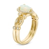 Previously Owned - Pear-Shaped Opal and 1/8 CT. T.W. Diamond Frame Vintage-Style Bridal Set in 14K Gold