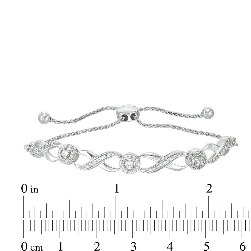 Previously Owned - 1/3 CT. T.W. Diamond Infinity Bolo Bracelet in 10K White Gold - 9.5"