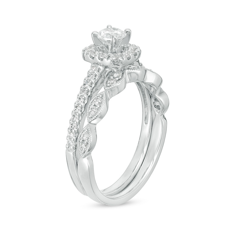 Previously Owned - 3/4 CT. T.W. Diamond Cushion Frame Vintage-Inspired Bridal Set in 10K White Gold