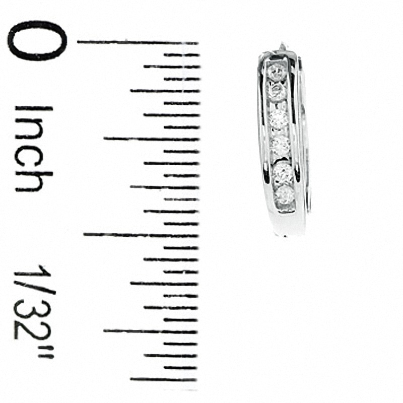 Previously Owned - 1/4 CT. T.W. Diamond Huggie Hoop Earrings in 10K White Gold