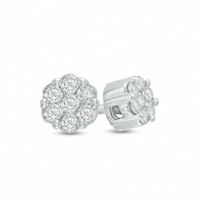 Previously Owned - 1/5 CT. T.W. Diamond Flower Stud Earrings in 10K White Gold