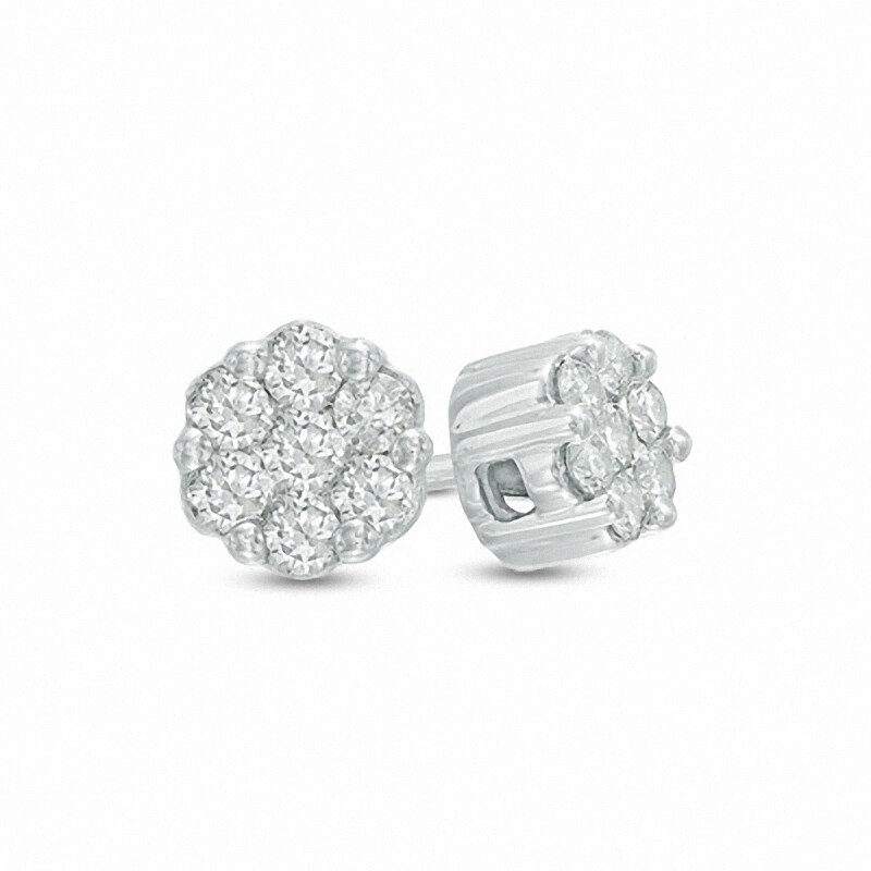 Previously Owned - 1/5 CT. T.W. Diamond Flower Stud Earrings in 10K White Gold