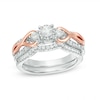 Thumbnail Image 1 of Previously Owned - 1/2 CT. T.W. Diamond Three Stone Loop Twist Bridal Set in 10K Two-Tone Gold