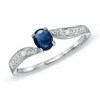 Thumbnail Image 1 of Previously Owned - Oval Blue Sapphire and Diamond Accent Engagement Ring in 10K White Gold