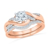 Thumbnail Image 0 of Previously Owned - Lab-Created White Sapphire and 1/10 CT. T.W. Diamond Twist Bridal Set in 10K Rose Gold