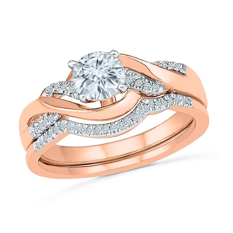 Previously Owned - Lab-Created White Sapphire and 1/10 CT. T.W. Diamond Twist Bridal Set in 10K Rose Gold