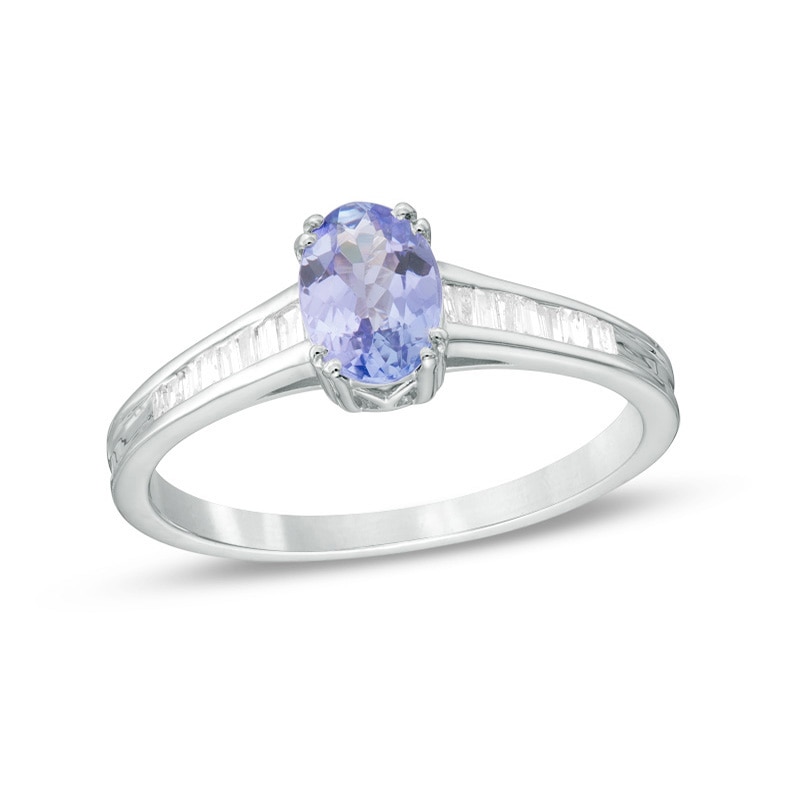 Previously Owned - Oval Tanzanite and 1/6 CT. T.W. Baguette Diamond Ring in 10K White Gold