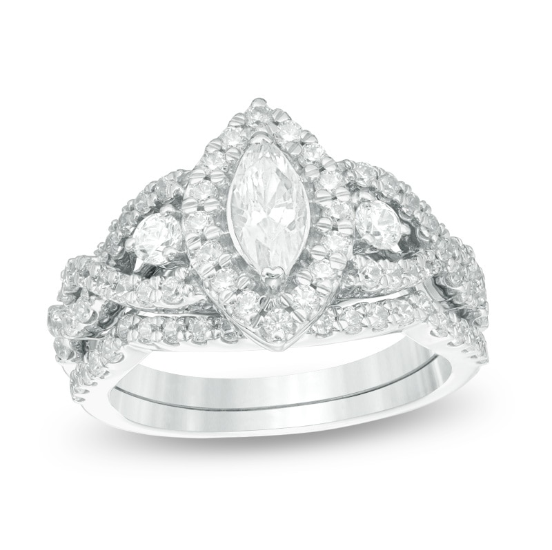 Previously Owned - 1-1/2 CT. T.W. Marquise Diamond Frame Twist Bridal Set in 10K White Gold