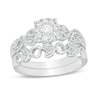 Thumbnail Image 1 of Previously Owned - Perfect Fit 1/3 CT. T.W. Diamond Frame Vine-Shank Interlocking Bridal Set in 10K White Gold